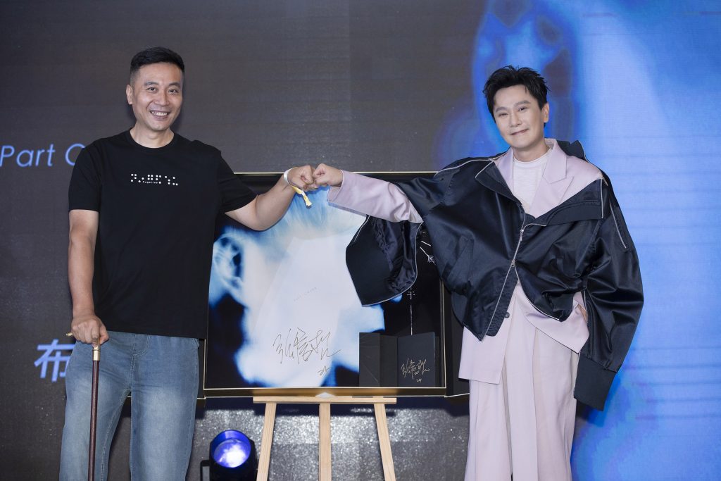 殘疾人老闆張信哲