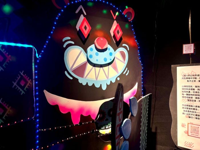 《圖說》《獵人的山林奇遇》黑熊竊笑，快樂得有點不正常，像是被城市文明迷幻。〈原民局提供〉