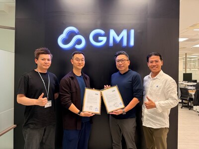 Four individuals pose in front of a GMI logo, holding signed documents as part of a collaboration announcement between Compal and GMI Cloud